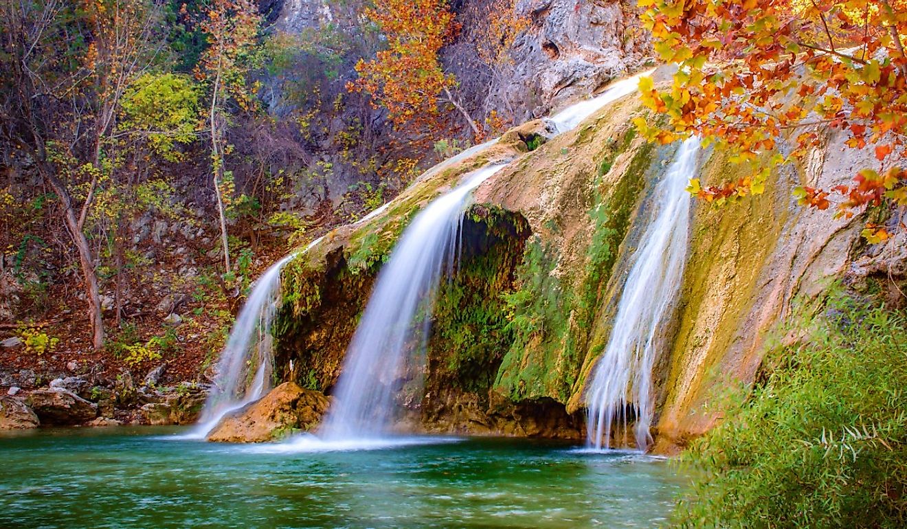 Color photograph of Turner Falls waterfall near Davis, Oklahoma, during autumn.