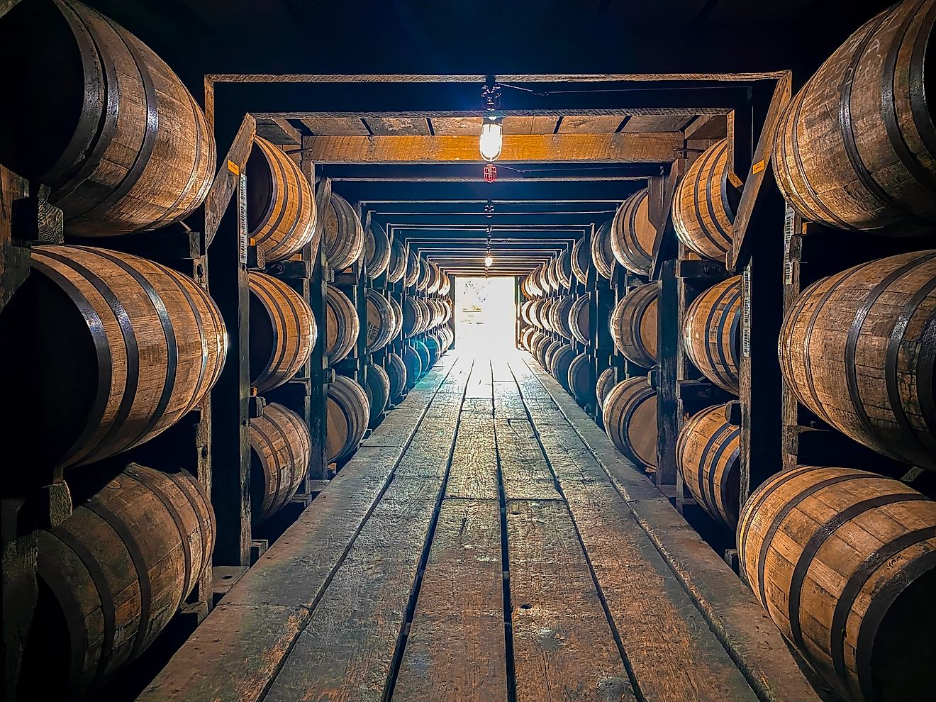 Bourbon barrels aging in a rickhouse