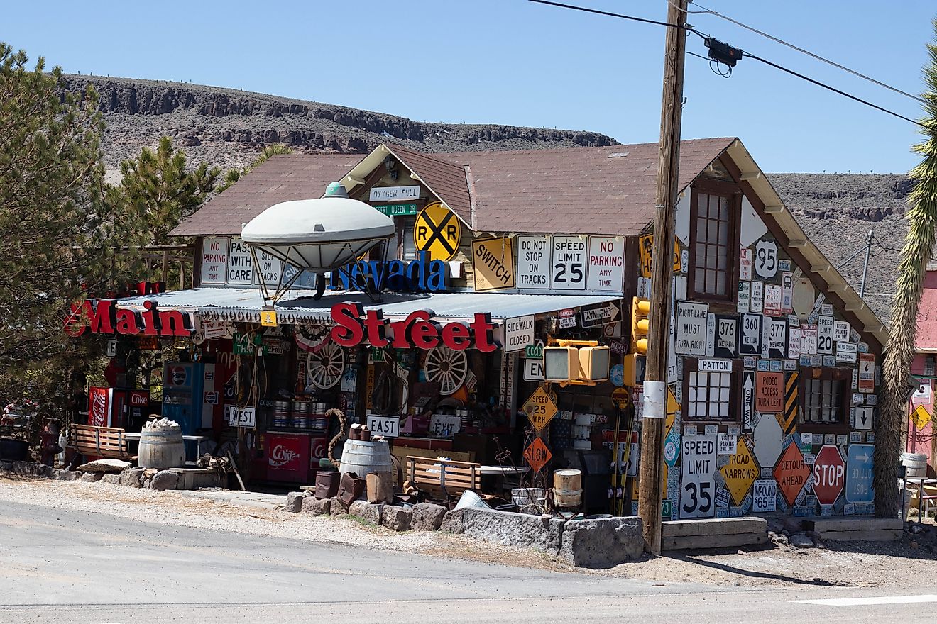 A quirky house in Goldfield, Nevada, covered in an eclectic assortment of road signs. Editorial credit: Megan Frost Photography / Shutterstock.com