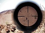 A target seen through a sniper scope during Marines' marksmanship training in Djibouti on Sep. 15, 2012. Image Credit DVIDSHUB via Public Domain.