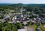 Aerial view of Hancock, Maryland and the forest and mountains near the Potomac River.