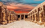 The statues of the Great Temple of Amun at sunset, with the stunning Karnak Temple in Luxor, Egypt