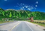 Amazing view of Jackson Village with road and mountains in summer season, Wyoming.