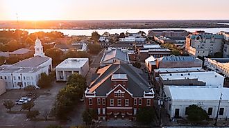 Sunset bathes historic downtown Natchez, Mississippi in golden light.