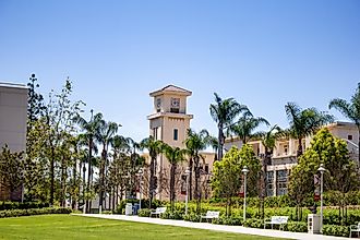 A wide shot of the Fowler School of Law building and the grassy quad or plaza area at Chapman University