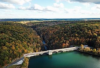 Aerial view of Pretty Boy Reservoir Dam in Hampstead, Maryland during fall.