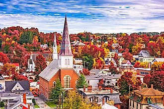 Montpelier, Vermont, USA, showcasing the town skyline amidst vibrant autumn foliage.