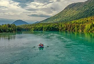 Kenai River on the Kenai Peninsula in the summer. Image credit Dana via Adobe Stock. 