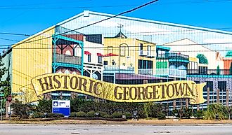 Building with colorful mural sign facade for historic city town and Liberty Steel in Georgetown, South Carolina. Editorial credit: Andriy Blokhin / Shutterstock.com