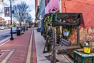 Goldsboro, North Carolina, USA: A view of downtown Goldsboro from a swing in front of a Thai restaurant. Editorial credit: Wileydoc / Shutterstock.com