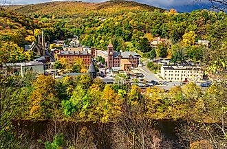 Aerial view of Jim Thorpe, Pennsylvania and surrounding Poconos Mountains during autumn.