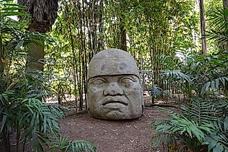 The outdoor museum of Parque Museo La Venta in Tabasco, Mexico, showcases ancient Olmec heads and other basalt carvings.Editorial credit: JC Gonram / Shutterstock.com