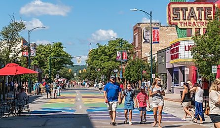 Busy Front Street in downtown with State Street Theater, in Traverse City, MI. Editorial credit: Heidi Besen / Shutterstock.com