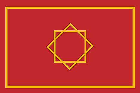 Red field with a large gold rectangle near and two overlapping squares in the middle