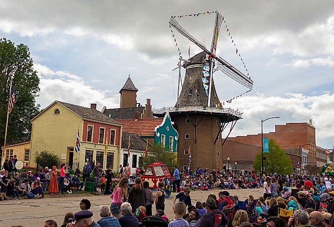 Downtown Pella, Iowa, during the Tulip Time Festival Parade. Image credit yosmoes815 via Shutterstock