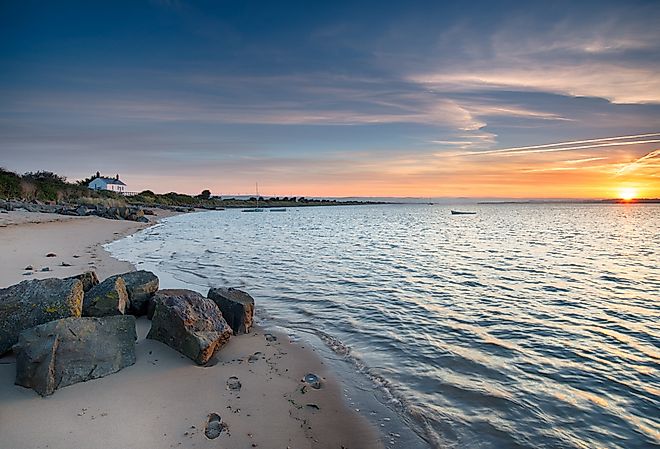 Beautiful sunrise over the beach at Crow Point near Barnstaple on the north coast of Devon. Image credit Helen Hotson via Shutterstock. 