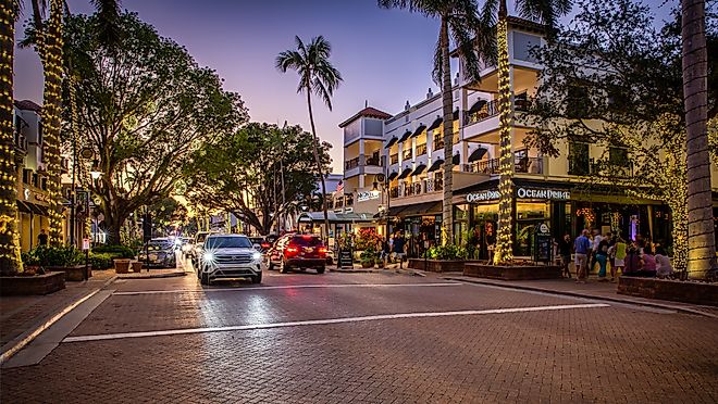 View of 5th Avenue at dusk in Naples, Florida. Editorial credit: Mihai_Andritoiu / Shutterstock.com