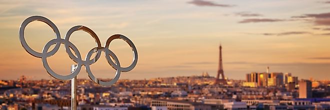 The Olympic Rings with the Eiffel Tower in the background. Image by Delpixel via Shutterstock.com