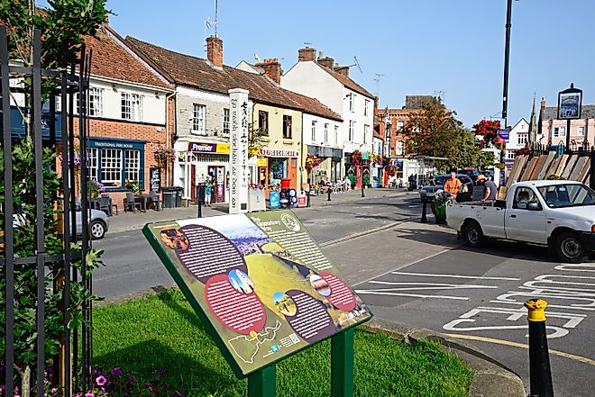 The Glastonbury Way information sign along Magdalene Street with town shops to the rear, Glastonbury, UK, via Caron Badkin / Shutterstock.com