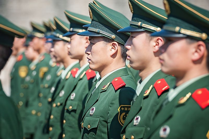 Chinese soldiers attend a parade at Tiananmen square on November 8, 2012 in Beijing, China