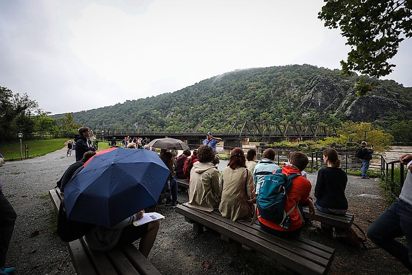  A group of visitors receives a guided tour of Harpers Ferry.