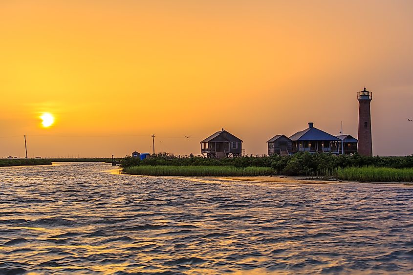 The historic Lydia Ann Lighthouse, built in 1851, stands proudly at sunset near Aransas Pass, Texas