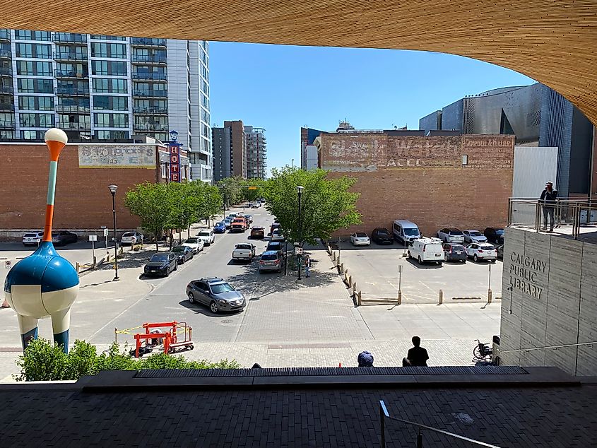 The glassy condos and old fashioned brick buildings of East Village as seen from the Calgary Central Library.