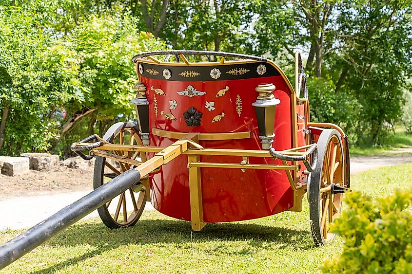 A reconstruction of a decorated ancient Roman chariot.