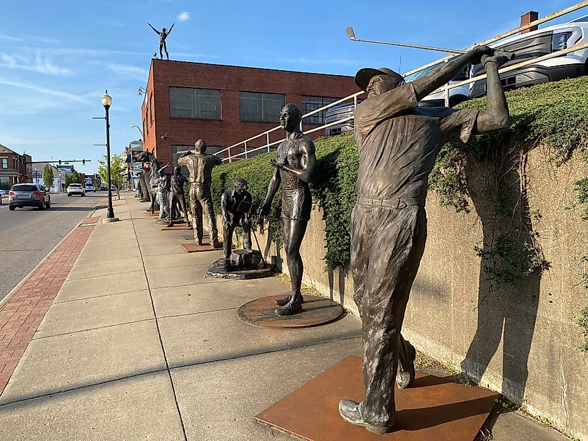 The Alan Cottrill Sculpture Studio and Gallery in Zanesville, Ohio, with bronze statues displayed street side.