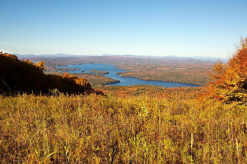 Scenic view of Lake Sunapee from the top of Mount Sunapee in Newbury, New Hampshire in autumn.