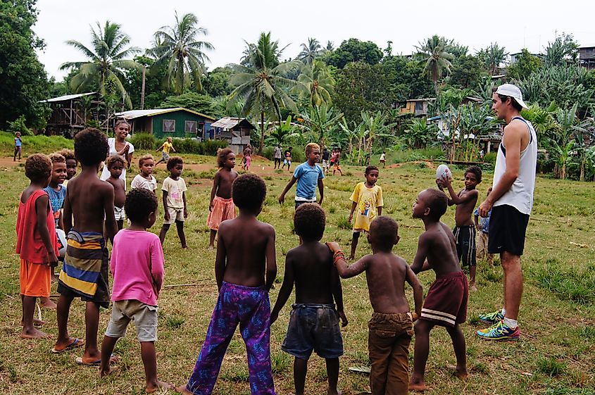 Junior AFL clinic at Kobito led by AFL development officer Michael Cormack. Image Credit Irene Scott/AusAID via Wikimedia.