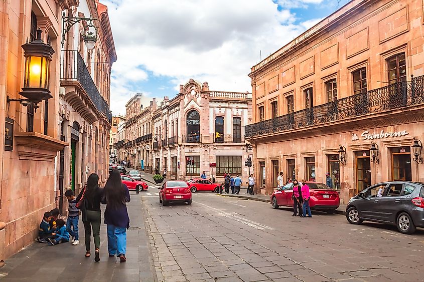 Street in Zacatecas on a sunny day with people walking
