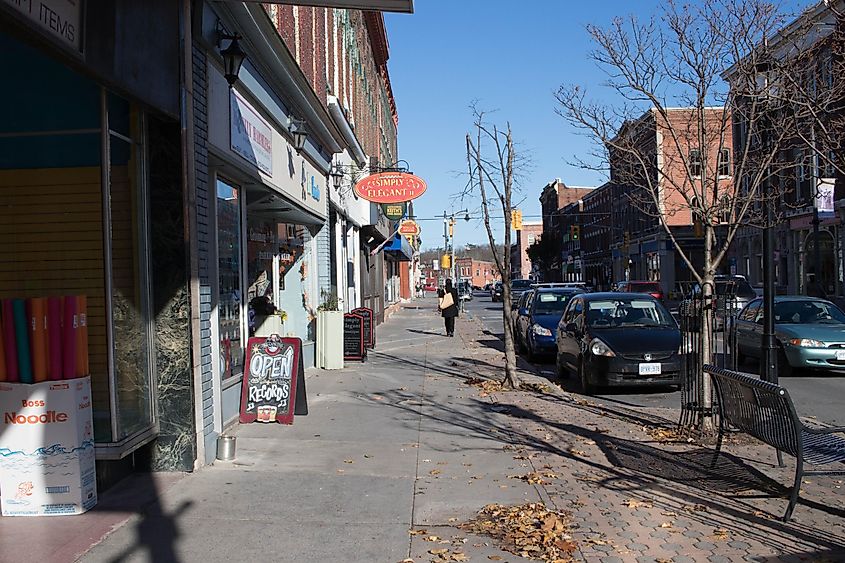 Dundas Street in downtown Napanee with woman walking on sidewalk in distance