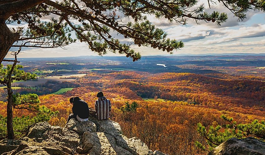 Two people enjoying a view on the Sugarloaf Mountain