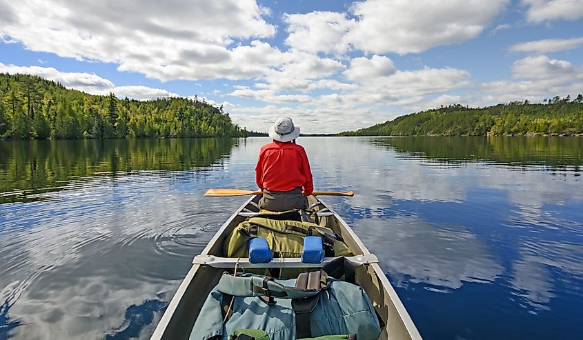 Canoer on Kekekabic Lake in the Boundary Waters in Minnesota.