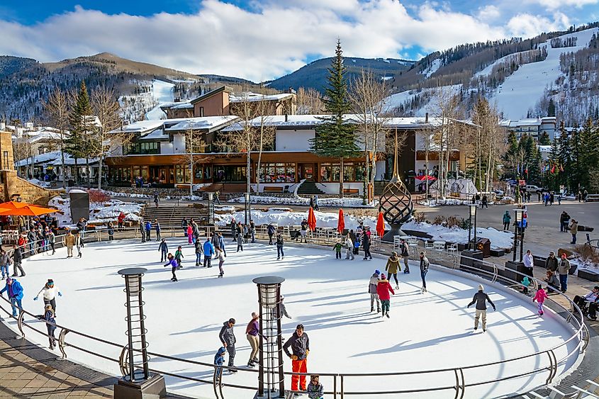 People having a great time at the ice skating rink in Vail, Colorado