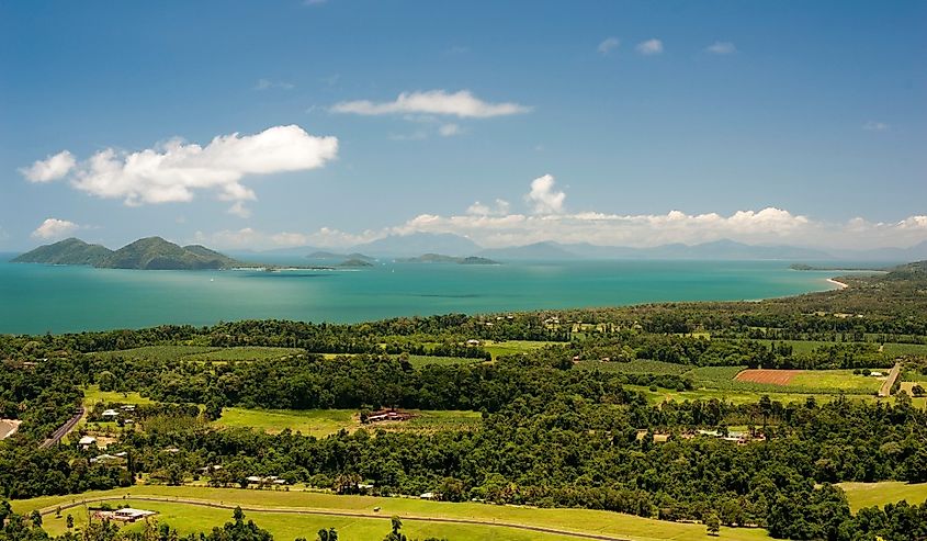 Scenic landscape view of Mission Beach,Queensland, Australia, with a view to offshore islands over lush green fields