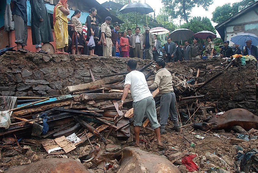 Workers cleaning rubble after the earthquake. Credit: Ministry of Home Affairs