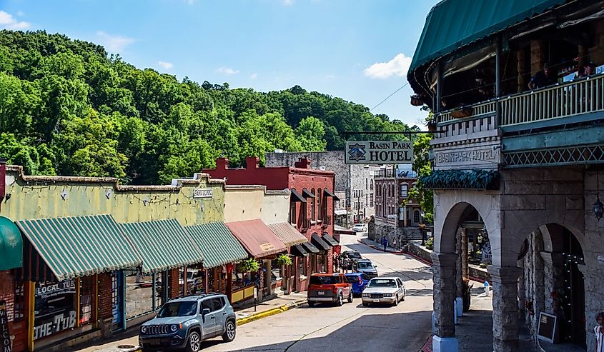 Downtown Eureka Springs, AR, with boutique shops and famous buildings.