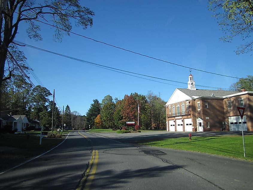 Putnam Road in Rotterdam, New York, featuring a quiet residential street lined with homes and trees.