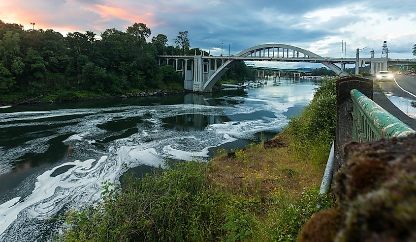 The Oregon City Bridge, also known as the Arch Bridge, is a steel through arch bridge spanning the Willamette River between Oregon City and West Linn, Oregon.