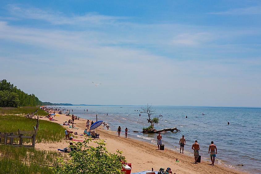 Beachgoers enjoy the sunshine at Southwick Beach State Park located on Lake Ontario, via JWCohen / Shutterstock.com