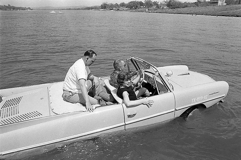 President Lyndon B. Johnson driving an Amphicar at Haywood Ranch with Eunice Kennedy Shriver and Paul Glynn, April 10, 1965. Image Via Public Domain.