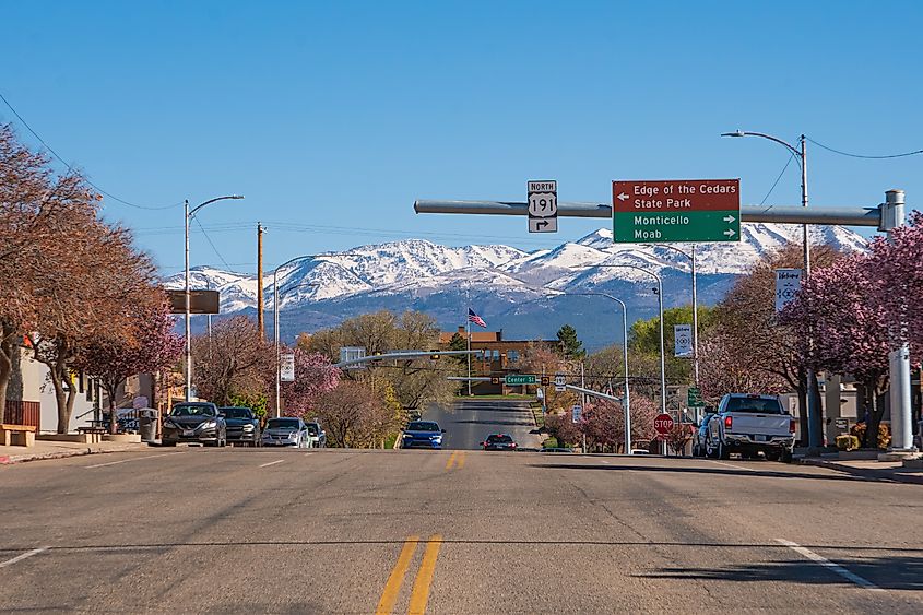 Small town of Blanding, southern Utah, offering views of snowcapped mountains from main street.