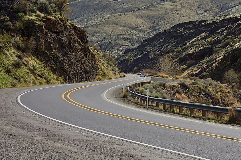 A tourist driving through the Yakima River Canyon Road