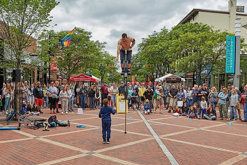 Pogo Fred with a participant at the Festival of Fools in Burlington, Vermont.