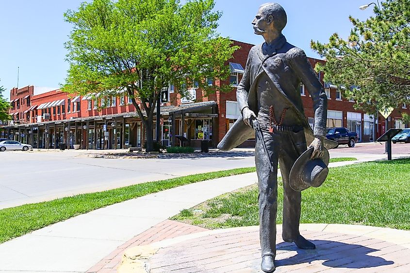 Bronze sculpture of Wyatt Earp as part of the Trail of Fame in the historic district of Dodge City, Kansas.