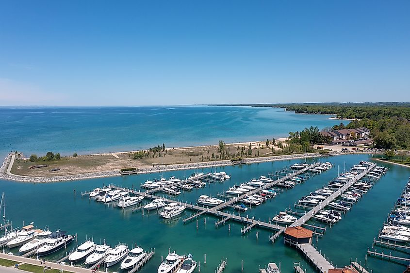 Boats docked along the coast of Elk Rapids, Michigan.