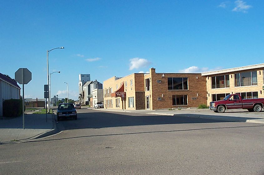 Street view of Grafton, North Dakota, showing buildings and shops along a quiet small-town road.