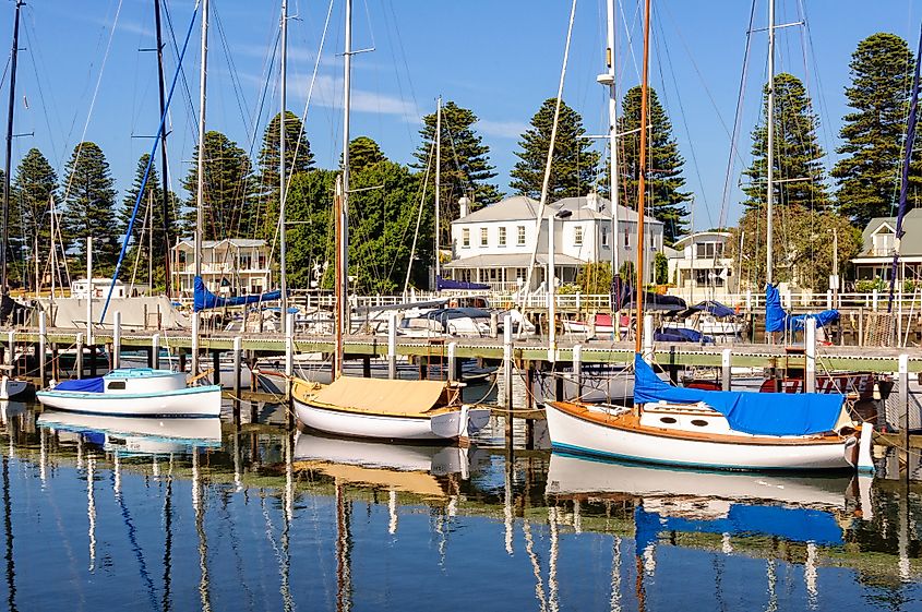 Boats docked along the Moyne River in Port Fairy, Victoria, Australia.